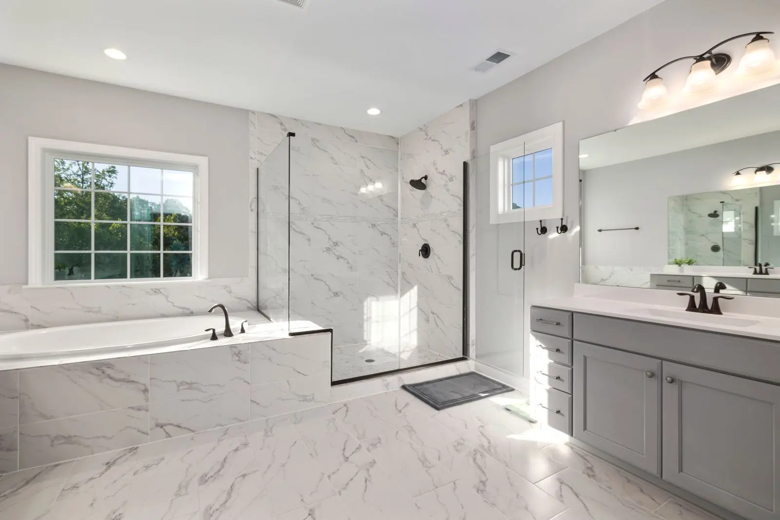 Luxury bathroom design inspiration with walk-in shower and double vanity